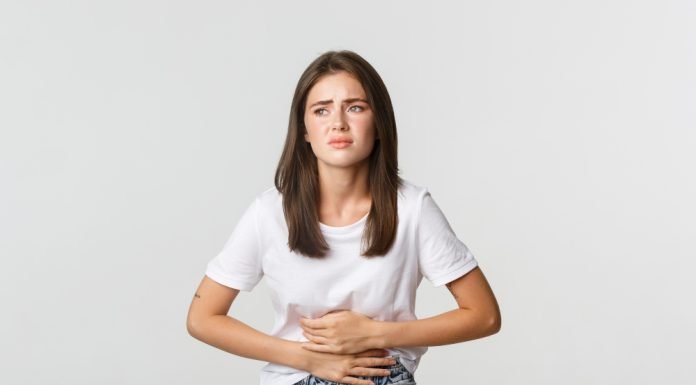 How to Perform First Aid for Food Poisoning Woman having stomach ache